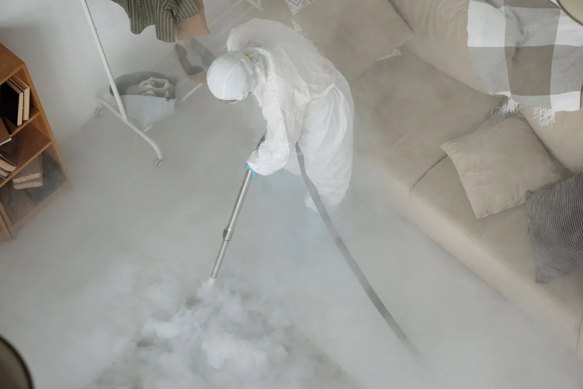Biohazard cleanup technician in protective equipment, Heron Bay, GA